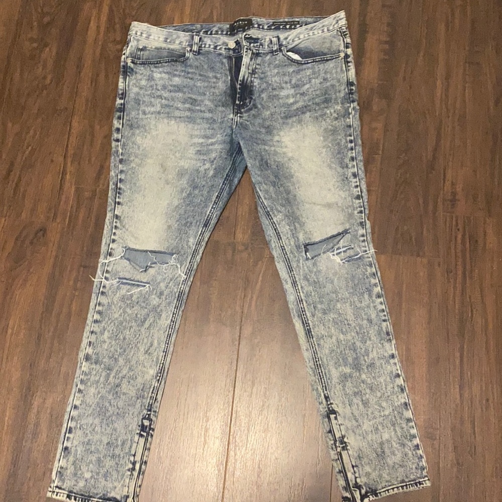 Stacked skinny distressed ripped jeans